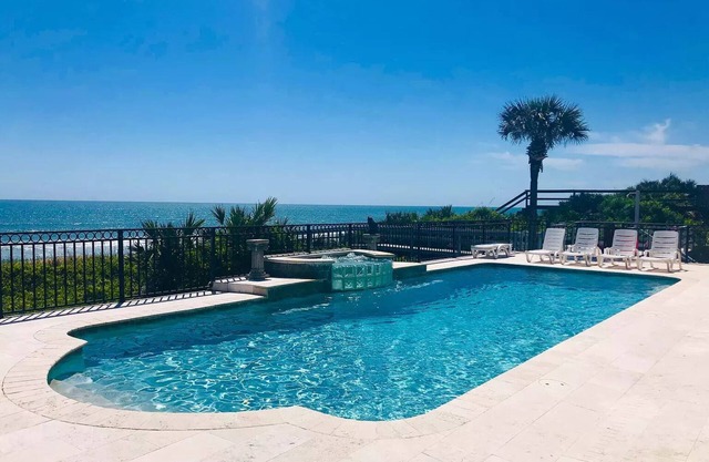 Breathtaking Oceanfront Vacation Rental with Beach Front Pool and Hot Tub!