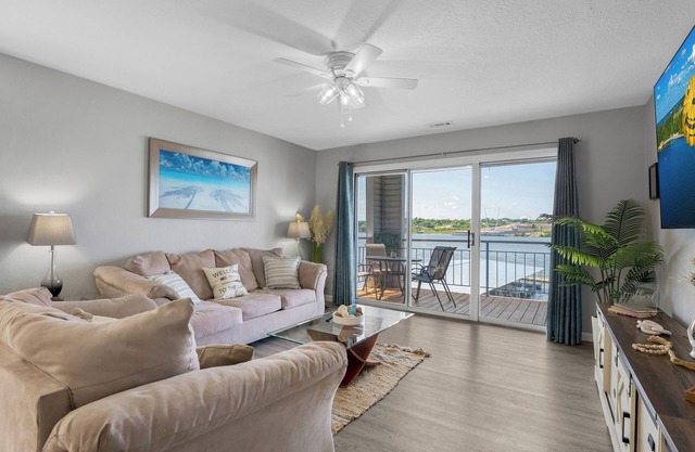 Bridgepointe ~Lakefront Condo with Stunning Main Channel Views & Private Deck!