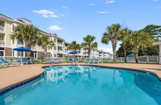 Bright 2BR Condo w/Pool – Pet-Friendly for 30 day Stays and Longer