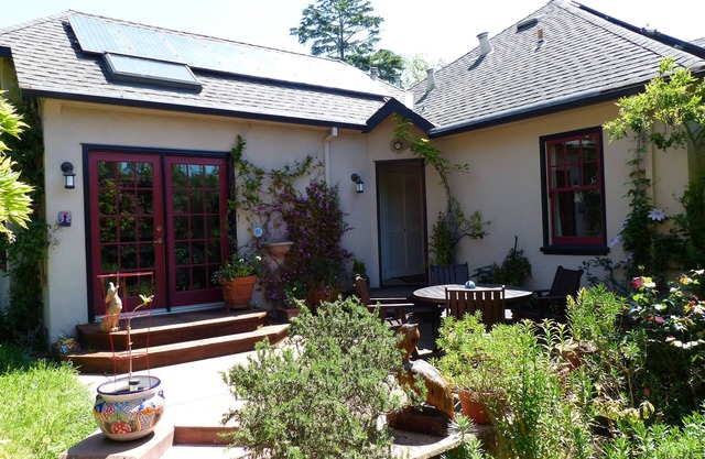 Bright, charming 4 BR Berkeley home, with beautiful patio and yard.