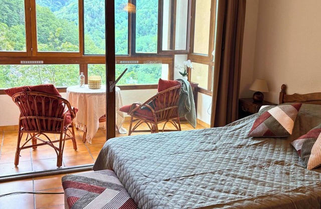 Bright studio with patio and mountain views