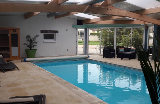 BURGUNDY RENOVATED FARMHOUSE WITH PRIVATE HEATED INDOOR POOL AND SAUNA
