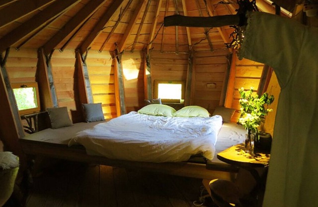 Cabin perched near a river, ideal for enjoying nature as a couple