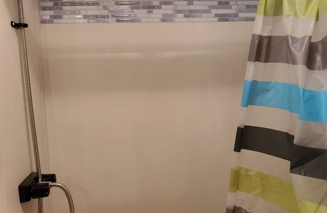 Camper sleeps 6 Nestled in a Wooded Area. Pet Friendly, Fire Pit, spacious