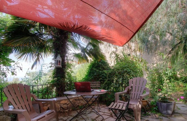 Casa Costa. LAMA. Durable and reasoned. Studio, terrace above the olive trees,