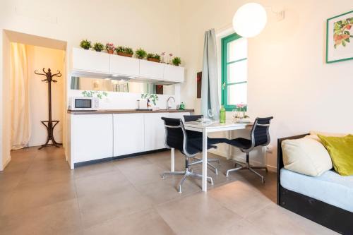 CaseOspitali - Casa Nina, romantico nido in antica corte in centro paese