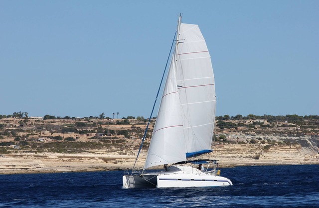 Catamaran with skipper and hostess Cyclades