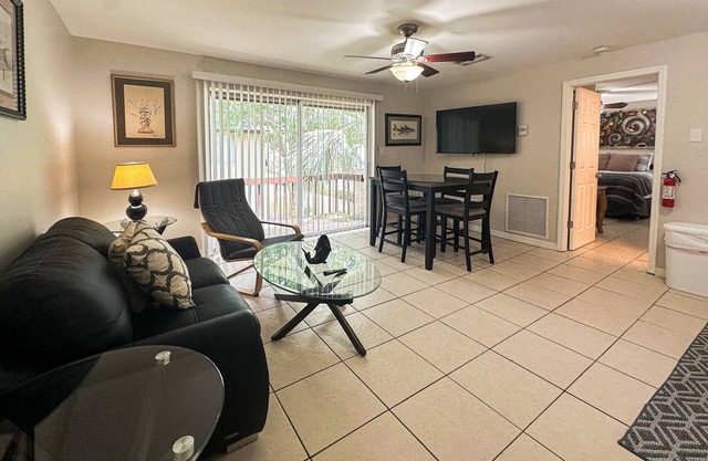 Centrally located condo with heated pool, balcony, washer/dryer & central AC