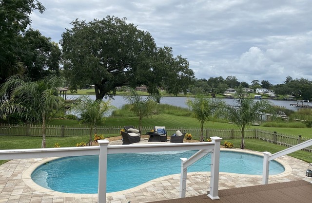 Centrally located, waterfront, Heated pool home.