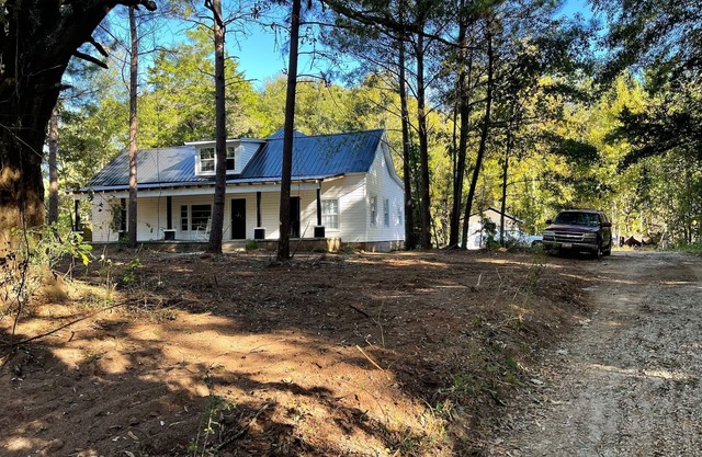 Century Farmhouse on 20 acres with streams and trails