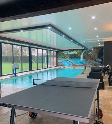 Chalet authentique à Clermont-Créans avec piscine partagée