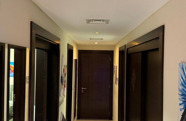 Charming 2-bedroom condo in Muscat with WiFi, fitness room, AC