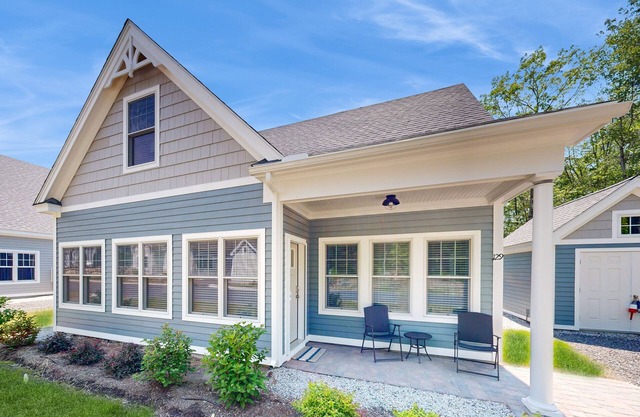 Charming cottage on a preserve with fireplace, WiFi, W/D, pool, gym, & game room