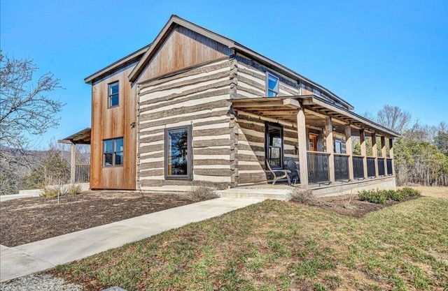 Charming, fully renovated 19th century cabin with spectacular views. 4 BR, 2 BA.