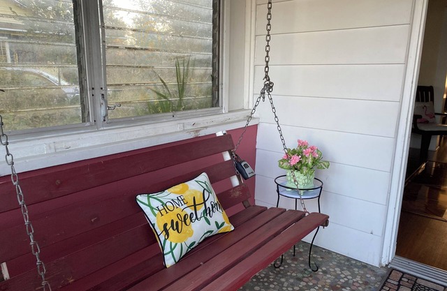 Charming Historic Cottage with Cozy Porch and Garden Retreat