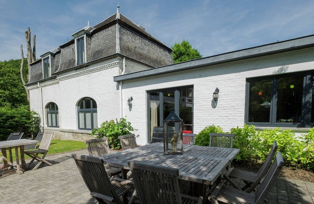 Charming holiday home along the Meuse with outdoor swimming pool