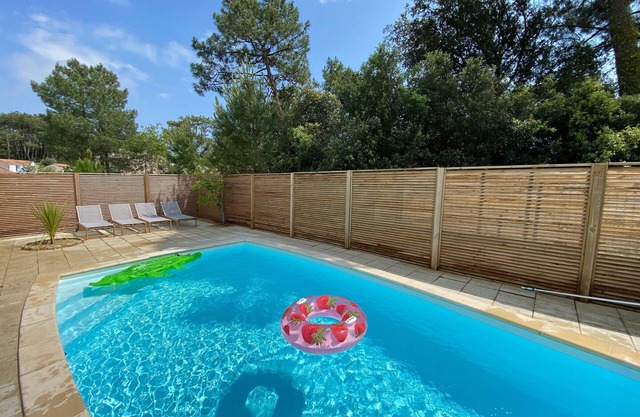 Charming Villa Near Beach with Heated Pool, Wi-Fi, Billiards, and Garage