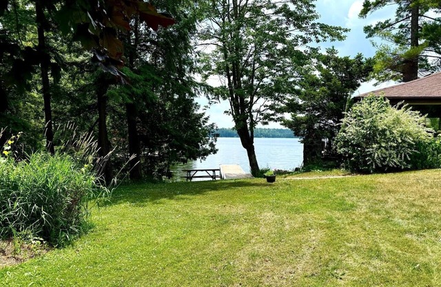 Charming waterfront retreat nestled on the serene shores of Oak Lake.