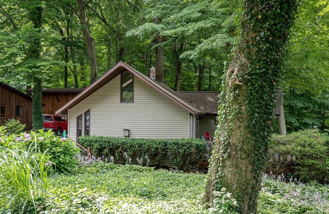 Charming Wooded Cottage with Lake Michigan Access!
