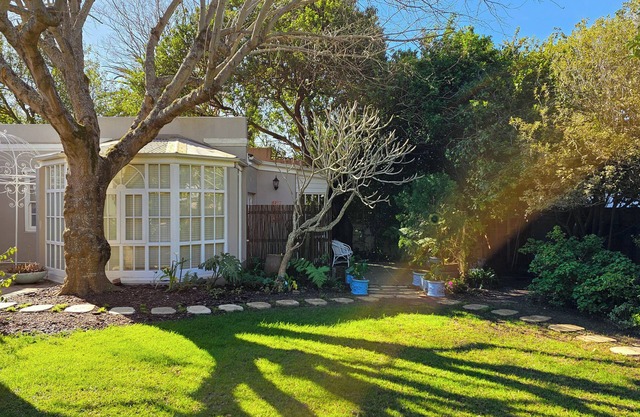 Cheerful cottage set in beautiful garden