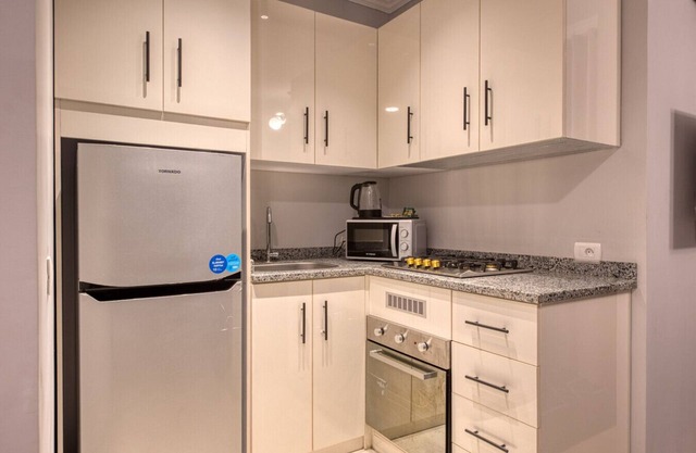 Chic Navy Nest 2BR | Comfort & Style in Lotus | Travelholic Stay