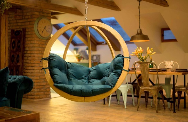 Chill in a Hanging Chair at an Old Town Bohemian Loft