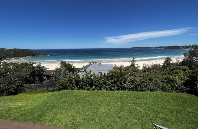 Classic beach cottage with amazing views and stroll to beach