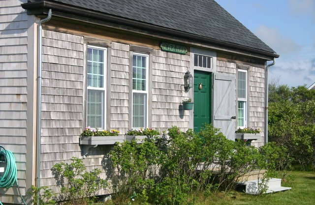 Classic Cape in an exclusive Tom Nevers Neighborhood.