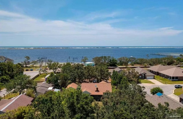 Close to beaches w/small private beach access across street, partial Gulf View.
