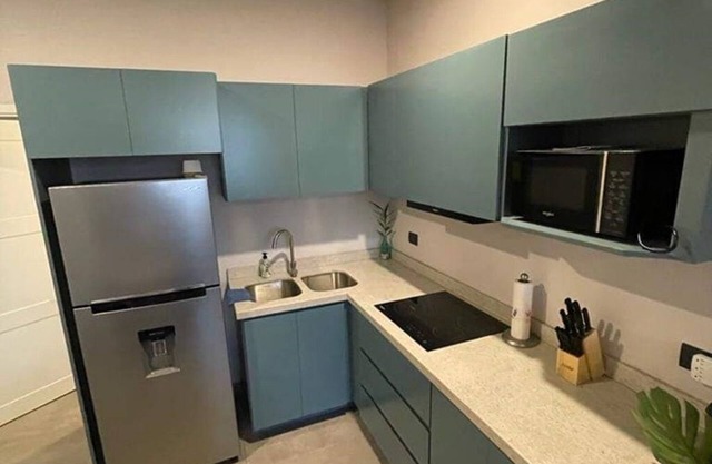 "Coastal Comfort: Stylish Apartment Just One Block from the Beach!"