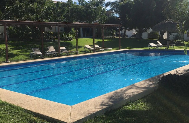 Coastal retreat on one level -2 minute walk to ocean