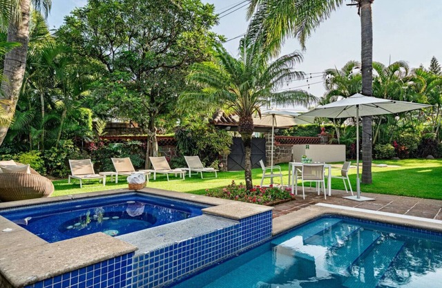 Colonial Getaway with Pool, Hot Tub, and Lush Garden for Relaxation