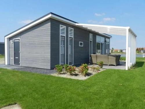 Comfortabel en modern ingericht huis met uitzicht op het meer 18a