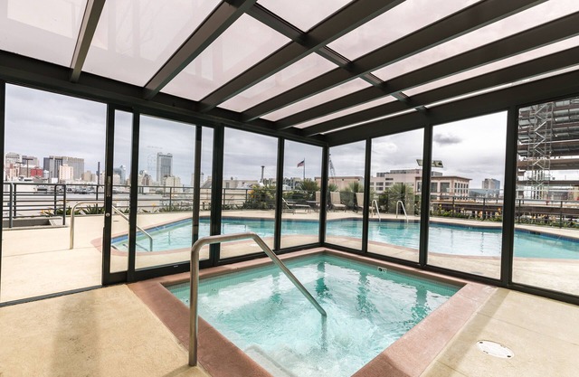 Condo with City View, Rooftop Pool, Security and Parking.