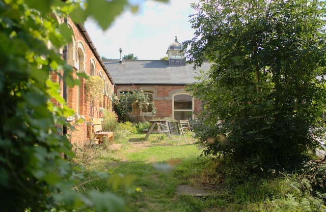 Converted stable block cottage with function room, courtyard garden & woodland