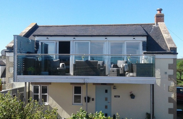 Cormorant Cottage . With Sea View Glass Balcony. Sleeps 7