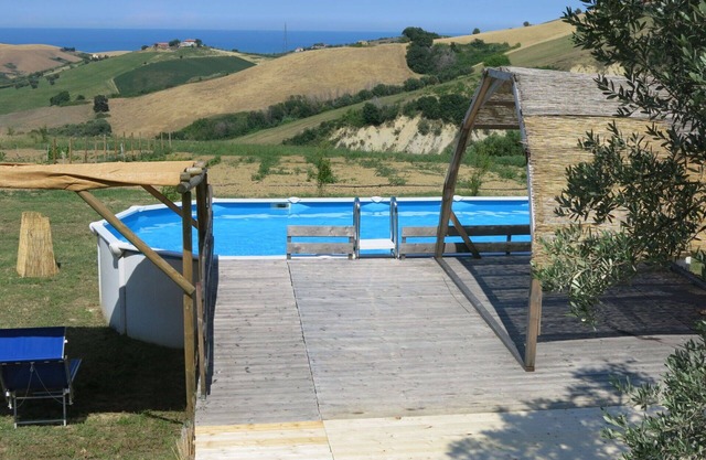 Cosy apartment in villa with A/C, pool, hot tub, WIFI, TV, patio, pets allowed and panoramic view