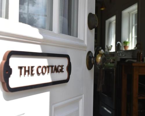 Cottage That Overlooks The Field