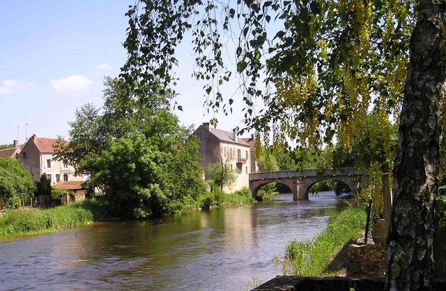 Cottage with terrace by river in natural park