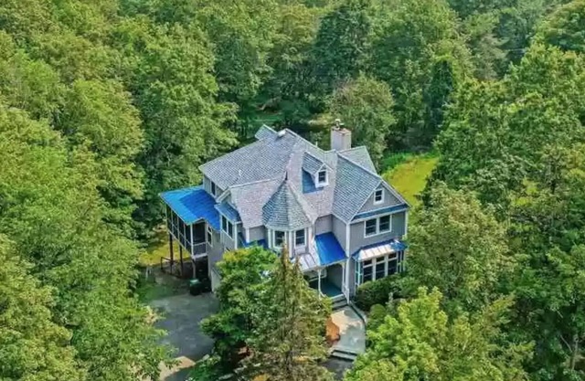 Country home with rock climbing gym, pond & creek.