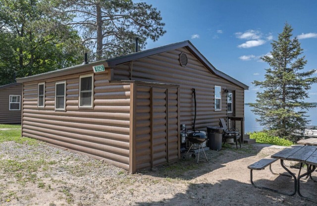 Cozy 2BR/1BA Lake Cabin | 25ft from Shore | Boat Landing | Fish House | All-Sports Lake