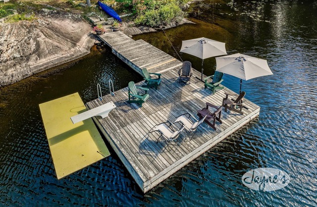 Cozy 4 bed 2 bath cottage on Pine Lake with 1 bed Bunkie! W Exposure! Hot Tub!