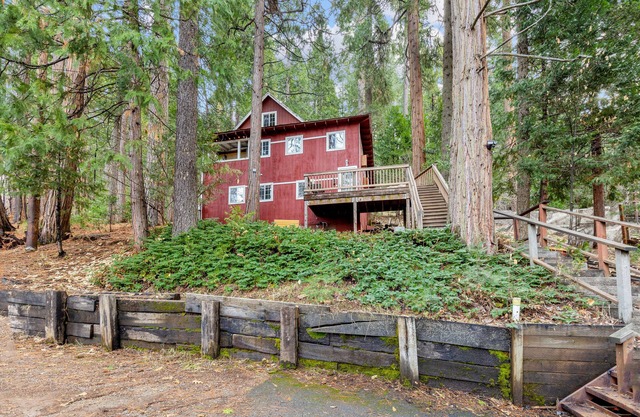 Cozy Blue Lake Springs cabin w/big trees, decks, game room, and private W/D