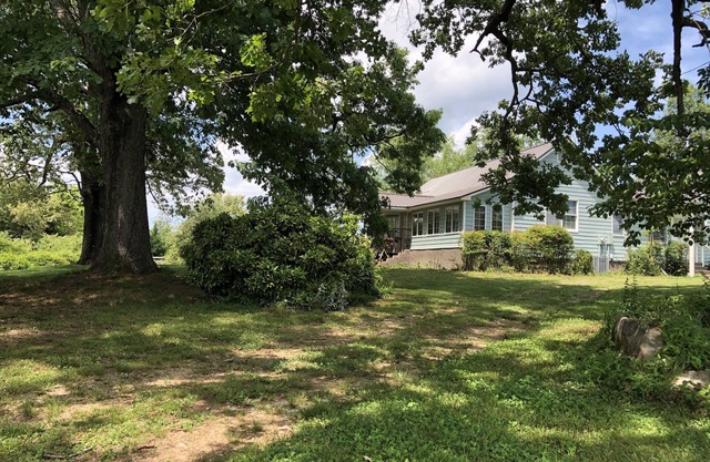 Cozy, private, fully restored 2300 SF farmhouse with adjoining acreage