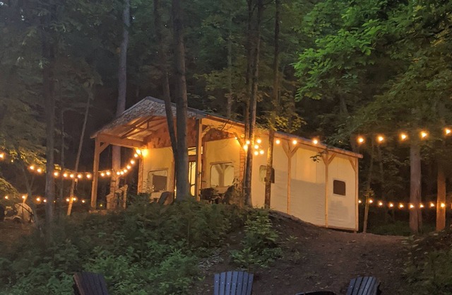 Custom design Safari Tent overlooking a serene running creek & natural waterfall