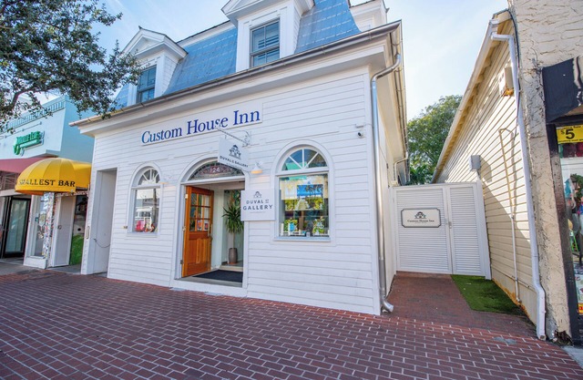 Custom House Inn | 8 BR Suite Compound on Duval!