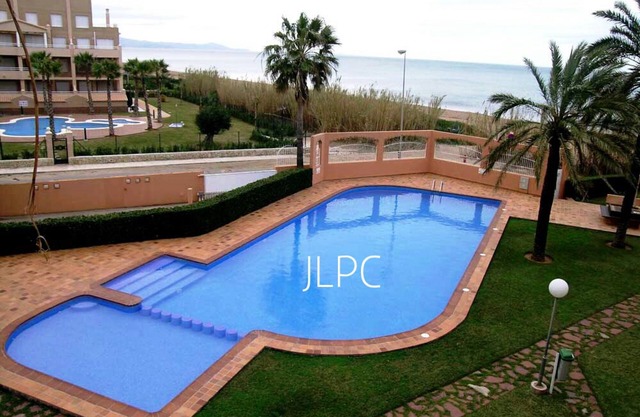 DENIA-APT IN FRONT OF THE SEA DIRECT ACCESS TO THE SANDY BEACH-WIFI-POOL-POOL-GARDEN-PARKING