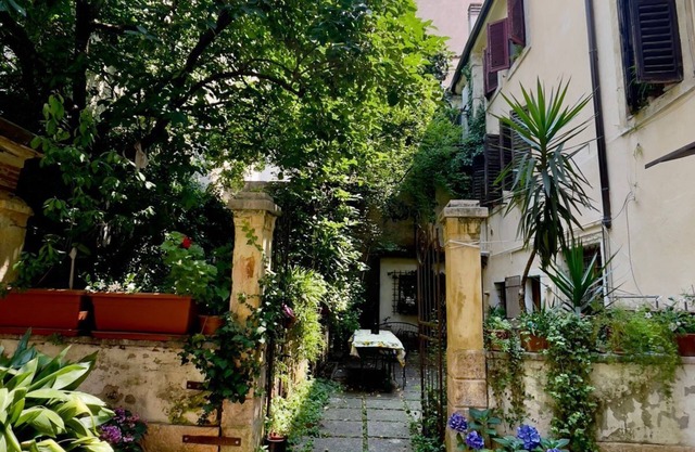 Detached apartment in seventeenth-century building with indoor garden.