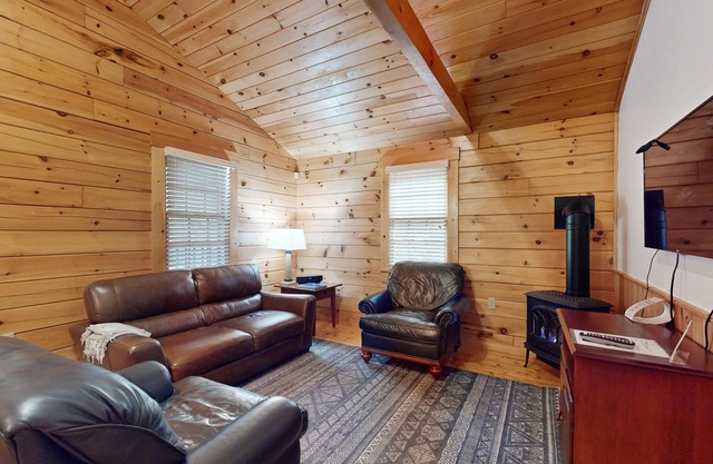 Dog-friendly cabin with firepit, kitchen, AC, & trails for your next escape