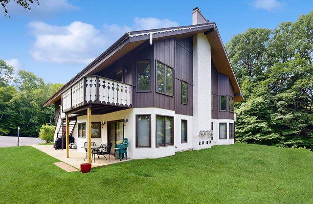 Dog-Friendly Condo with Patio, Wood Stove, Full Kitchen, W/D, & Free WiFi
